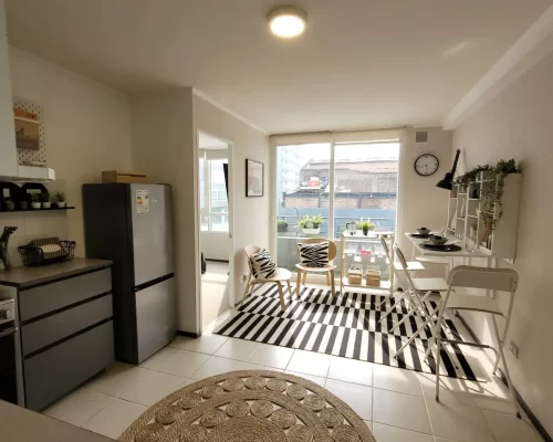 02-quinta-normal-bono-pie-living comedor.webp